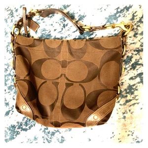 Medium sized brown gently used Coach bag